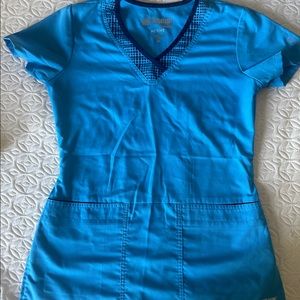 Turquoise colored Grey’s Anatomy scrub top